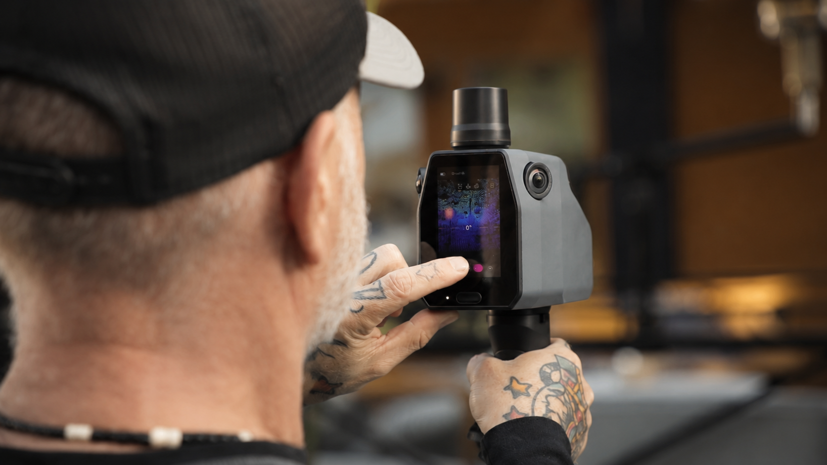 Robotic Data operator scanning with a handheld LiDAR device